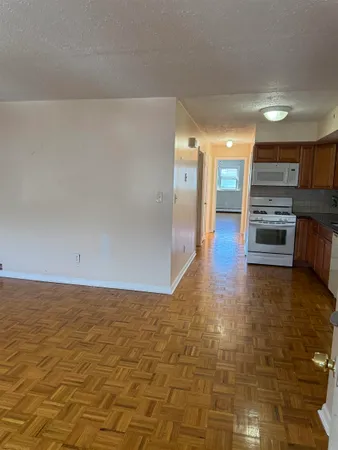 a view of a kitchen with a sink