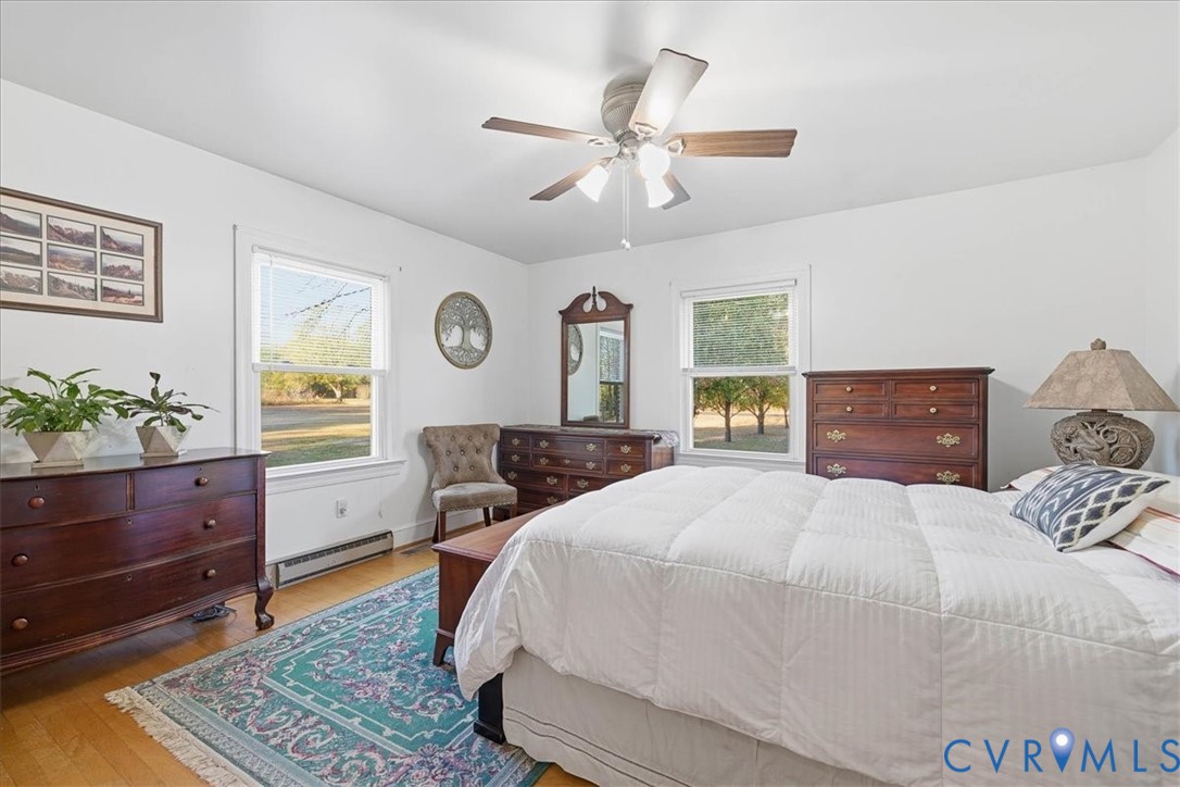 15357 Old Forty Road Waverly, VA 23890 - Photo 21 of 42 a bedroom with a bed and a dresser