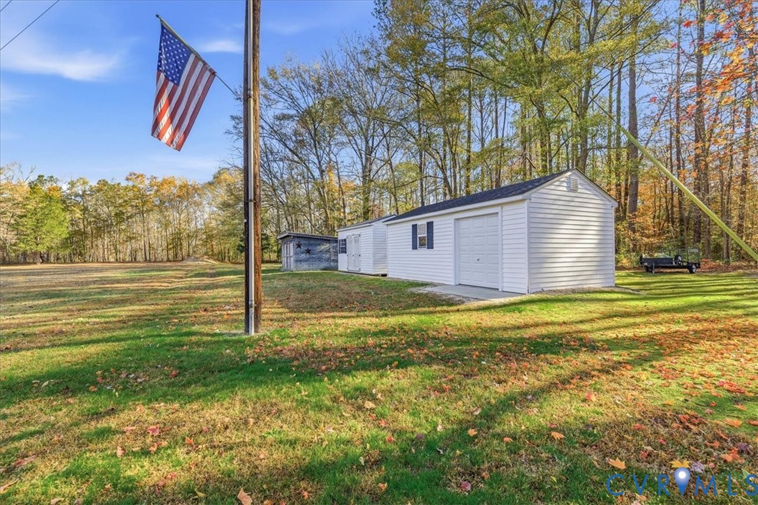15357 Old Forty Road Waverly, VA 23890 - Photo 27 of 42 a front view of a house with a yard