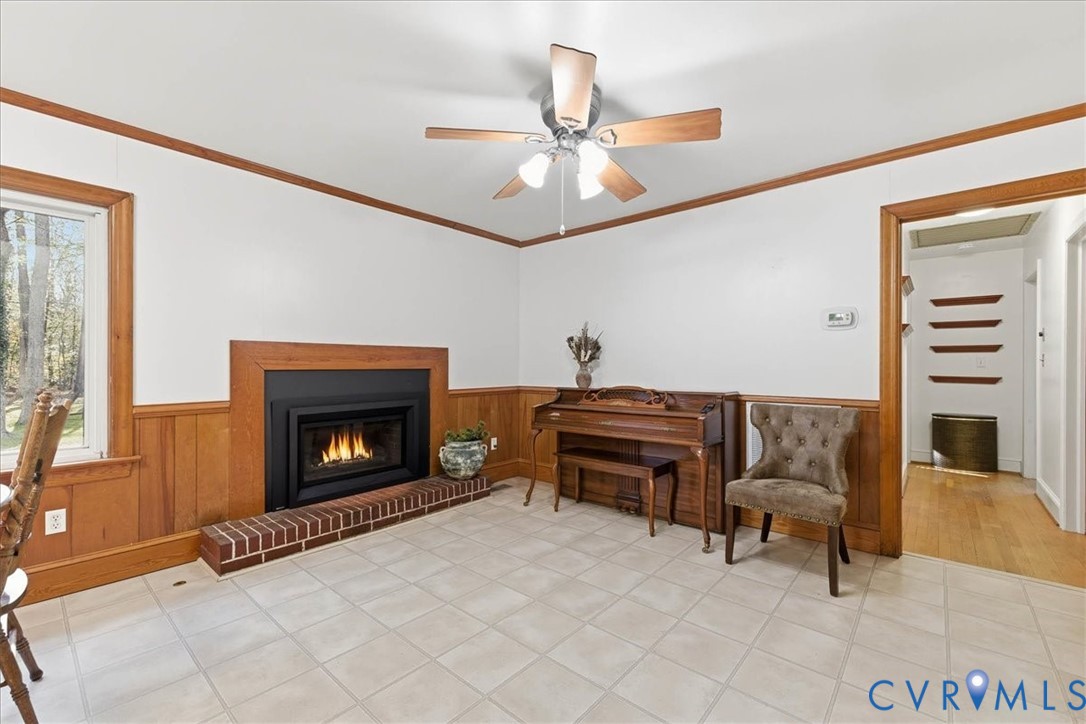 15357 Old Forty Road Waverly, VA 23890 - Photo 8 of 42 a living room with furniture and a fireplace