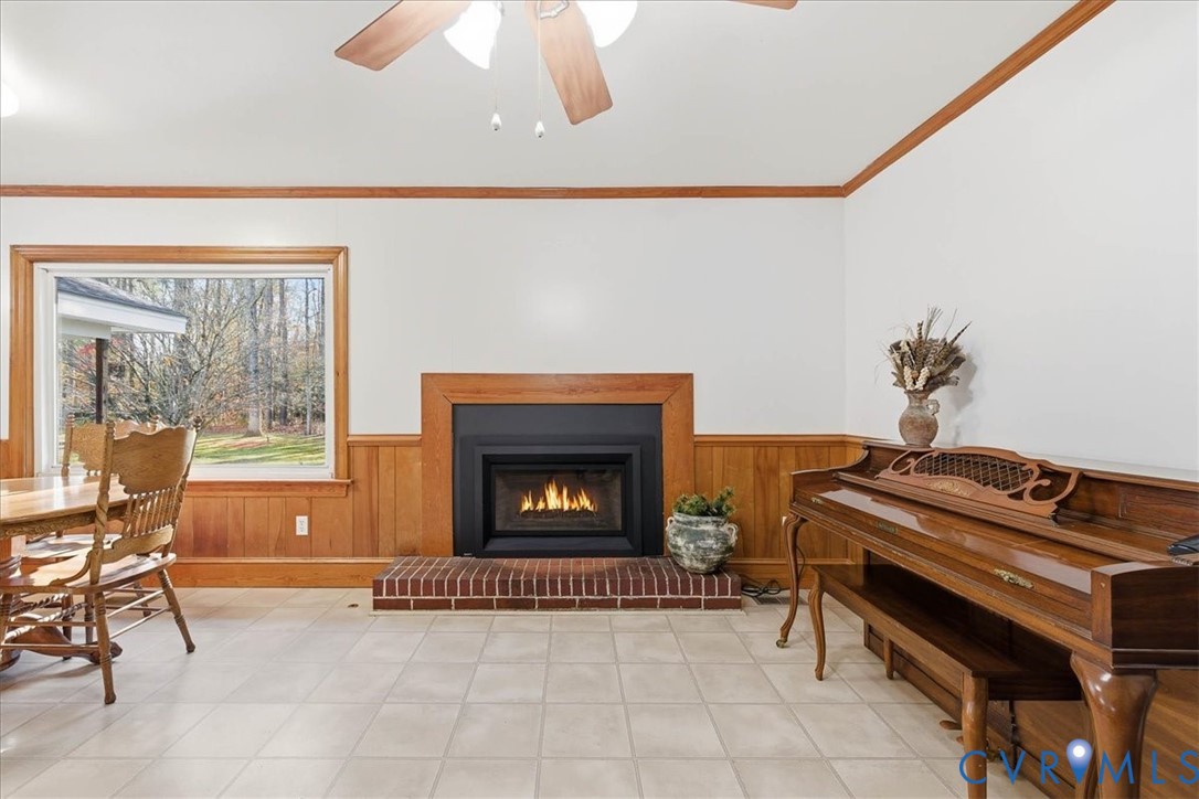15357 Old Forty Road Waverly, VA 23890 - Photo 9 of 42 a living room with furniture and a fireplace