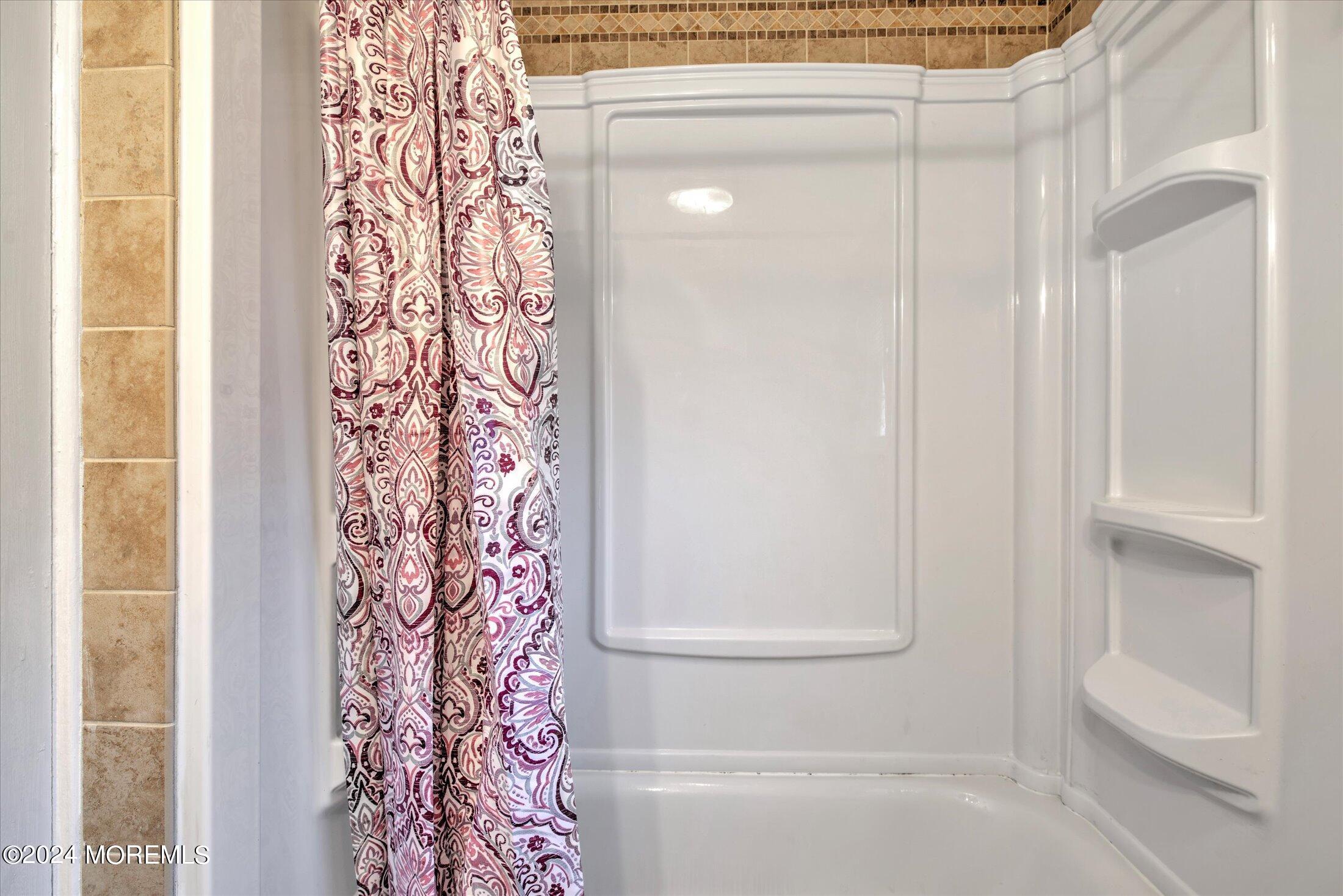 17 Club Place Freehold, NJ 07728 - Photo 17 of 27 a bathroom with a bathtub