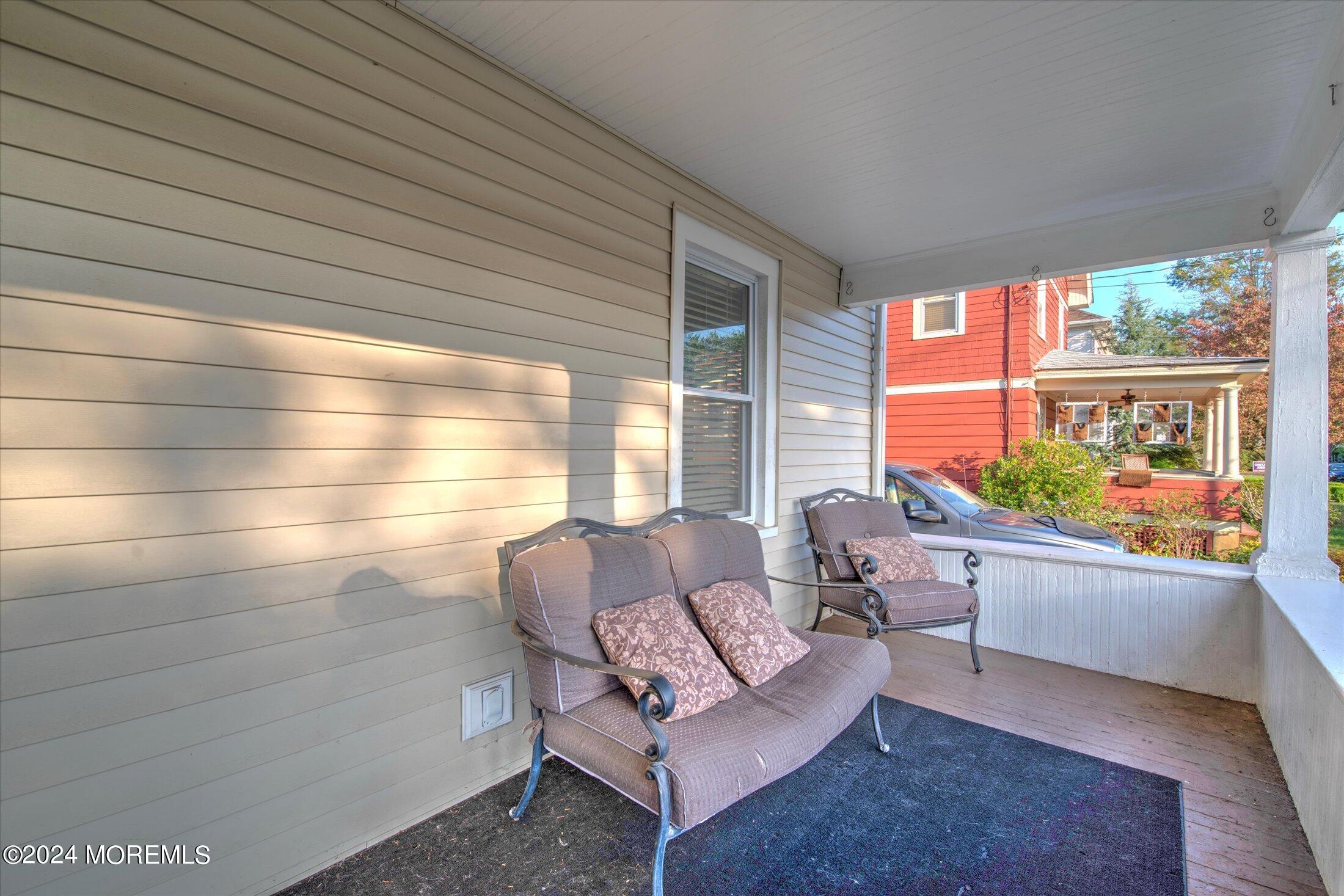 17 Club Place Freehold, NJ 07728 - Photo 2 of 27 a living room with furniture and a large window