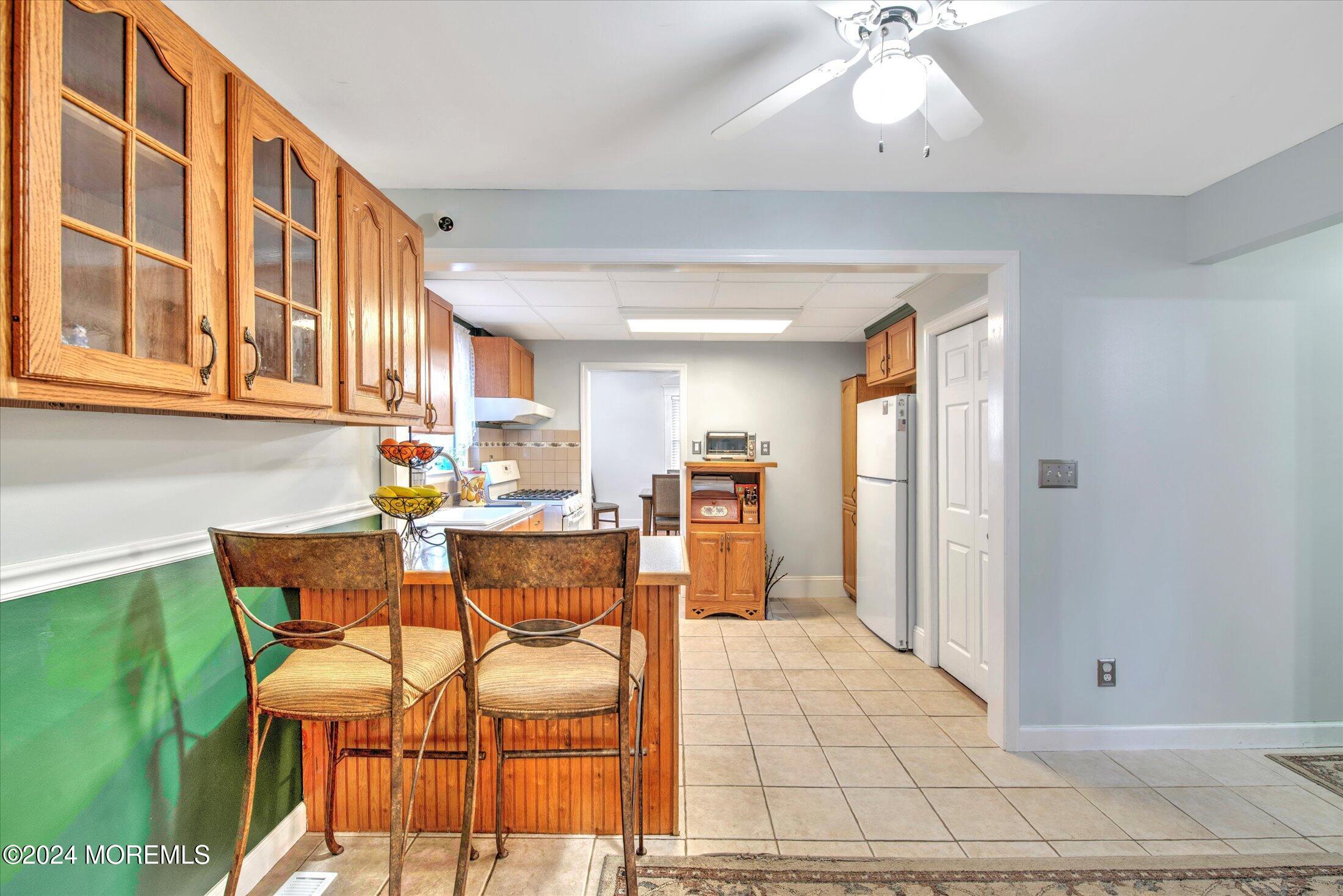 17 Club Place Freehold, NJ 07728 - Photo 10 of 27 a view of a dining room with furniture