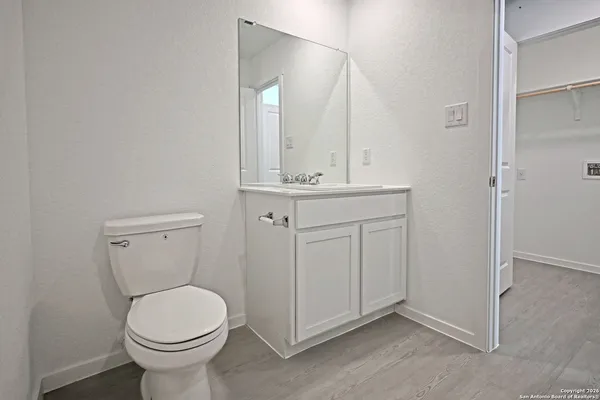 a bathroom with a sink and a toilet