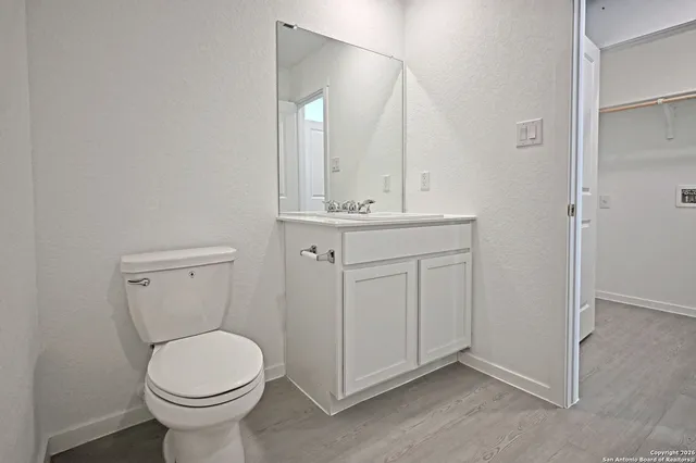 a bathroom with a sink and a toilet