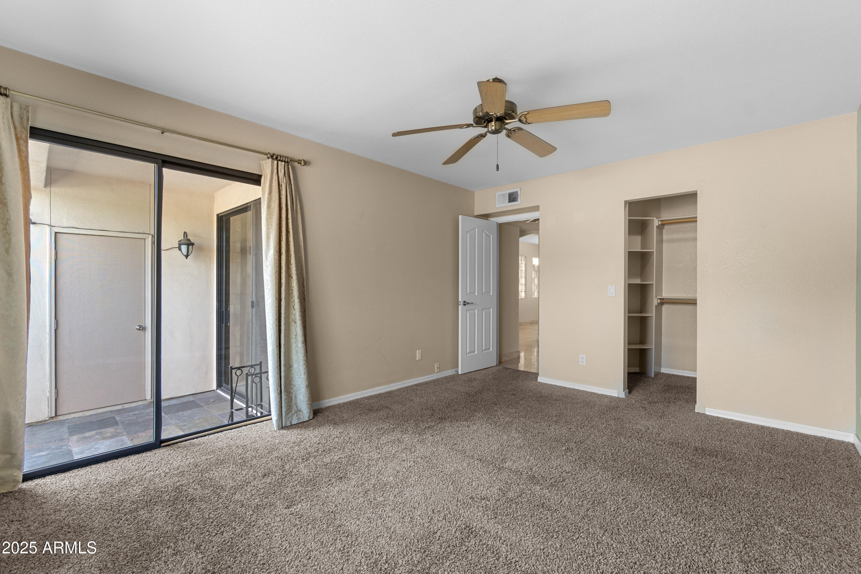 3235 East Camelback Road, Unit 124 Phoenix, AZ 85018 - Photo 15 of 22 17-Primary bedroom