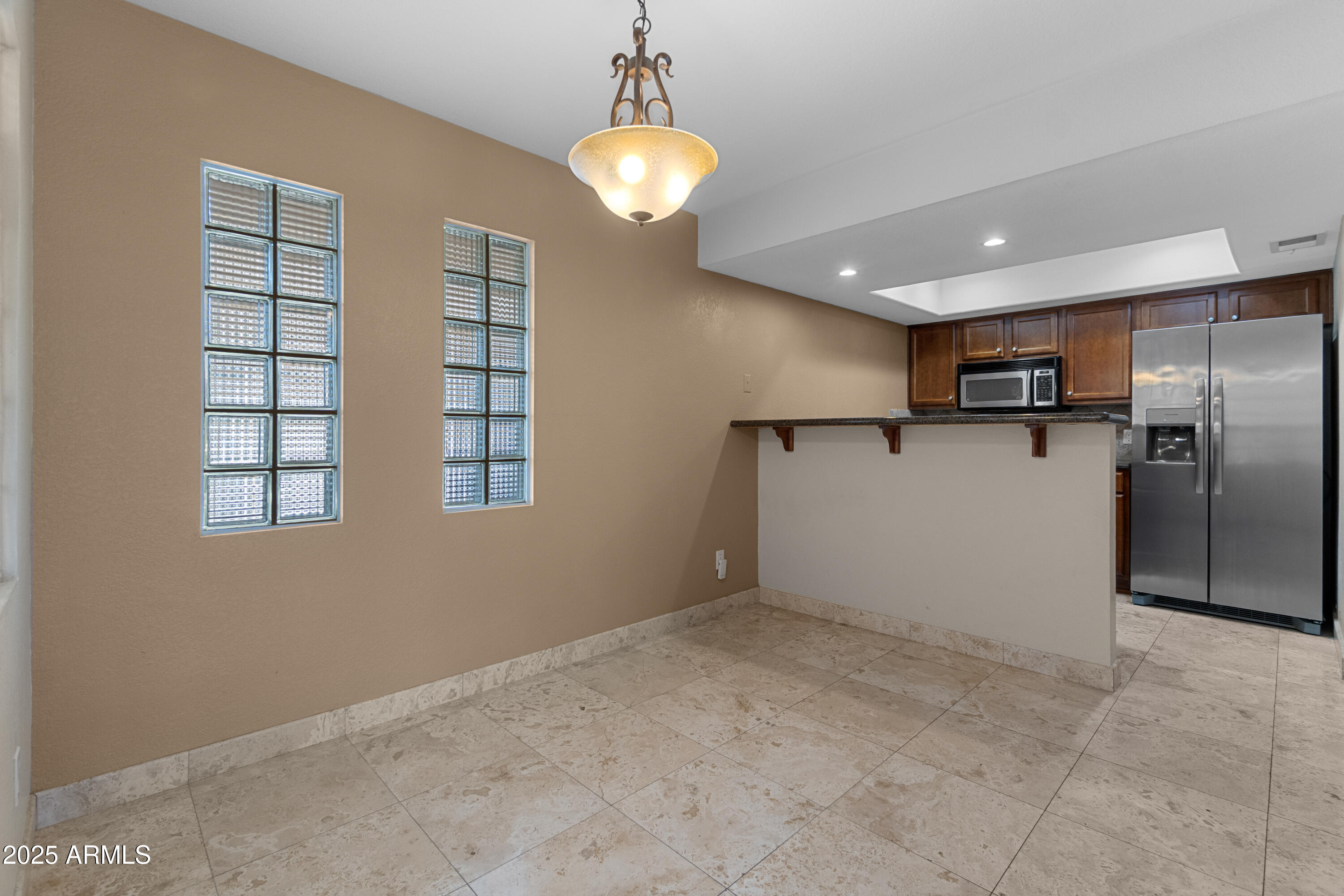 3235 East Camelback Road, Unit 124 Phoenix, AZ 85018 - Photo 7 of 22 07-Dining and Kitchen