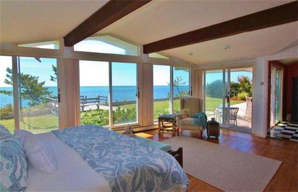 89 Shore Road Harwich, MA 02671 - Photo 14 of 20 a spacious bedroom with a large window and a balcony
