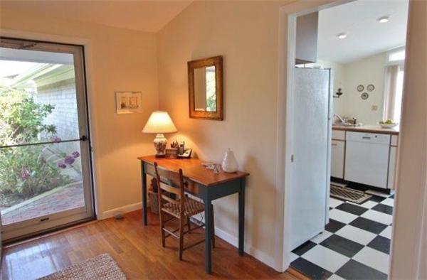 89 Shore Road Harwich, MA 02671 - Photo 6 of 20 a room with a table and chairs