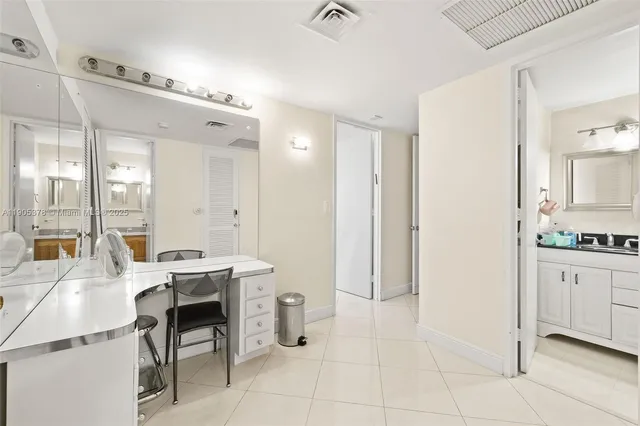 a room with a table and chairs