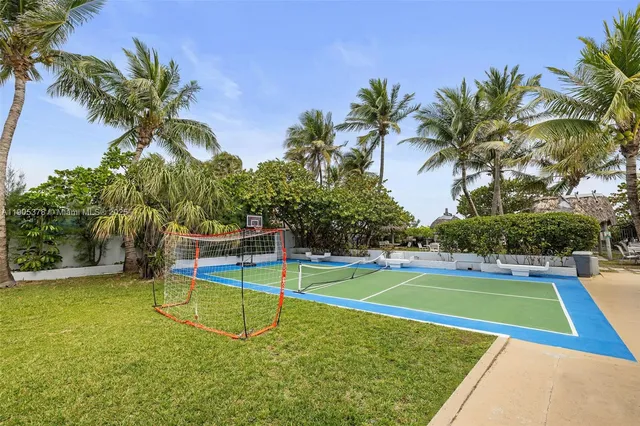 a view of a backyard with swimming pool