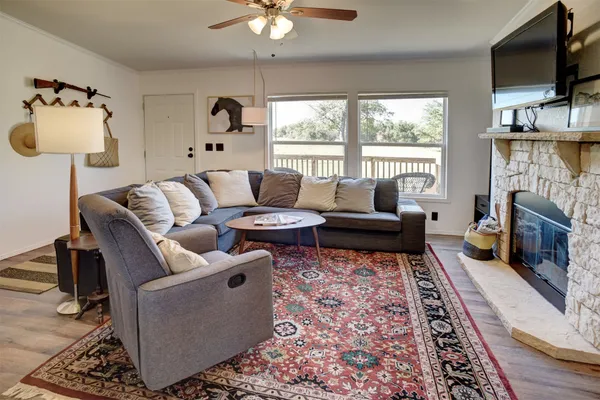 a living room with furniture and a rug