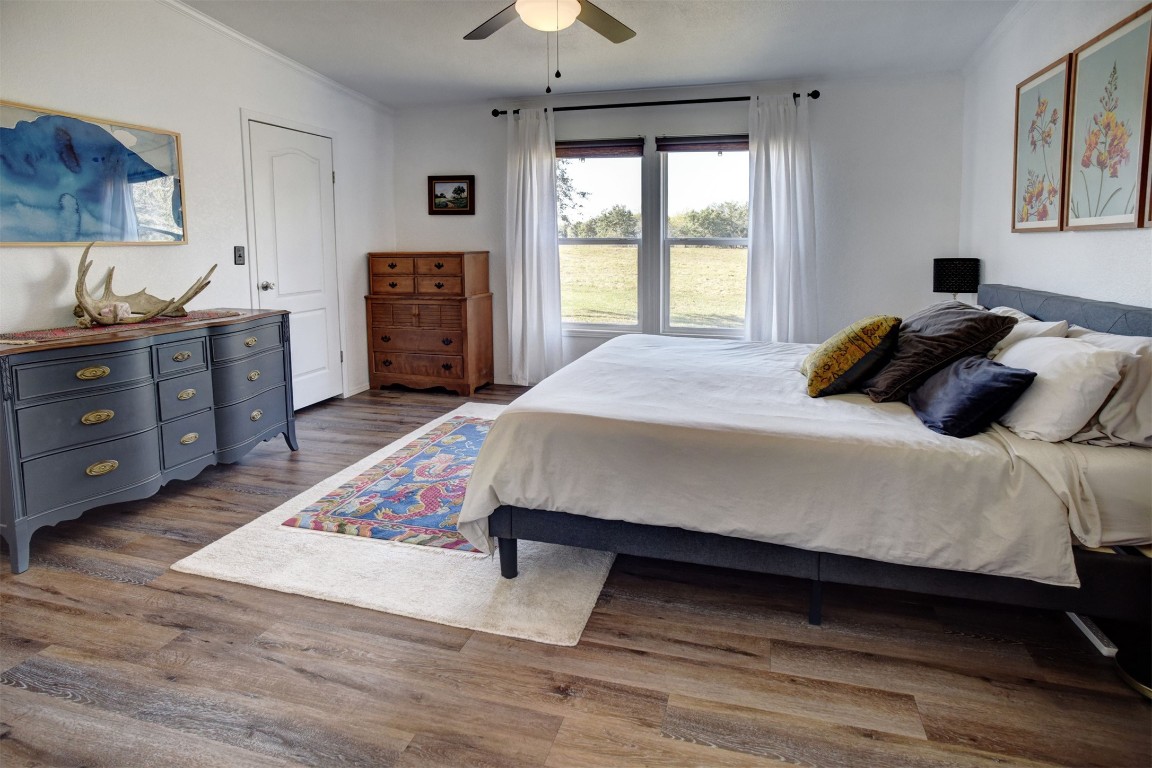 421 Krchnak Road Smithville, TX 78957 - Photo 18 of 40 a bedroom with a bed and a window