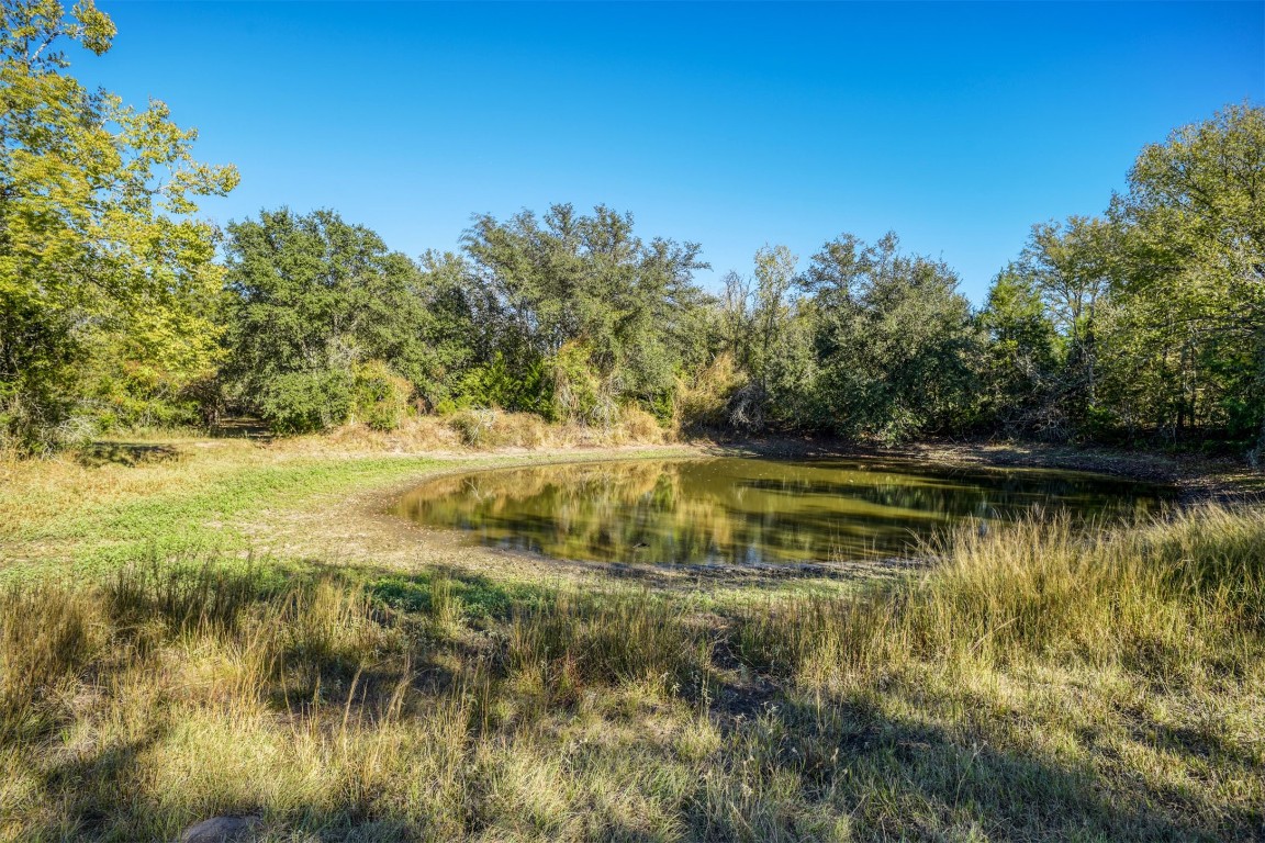 421 Krchnak Road Smithville, TX 78957 - Photo 29 of 40 a view of lake with green space