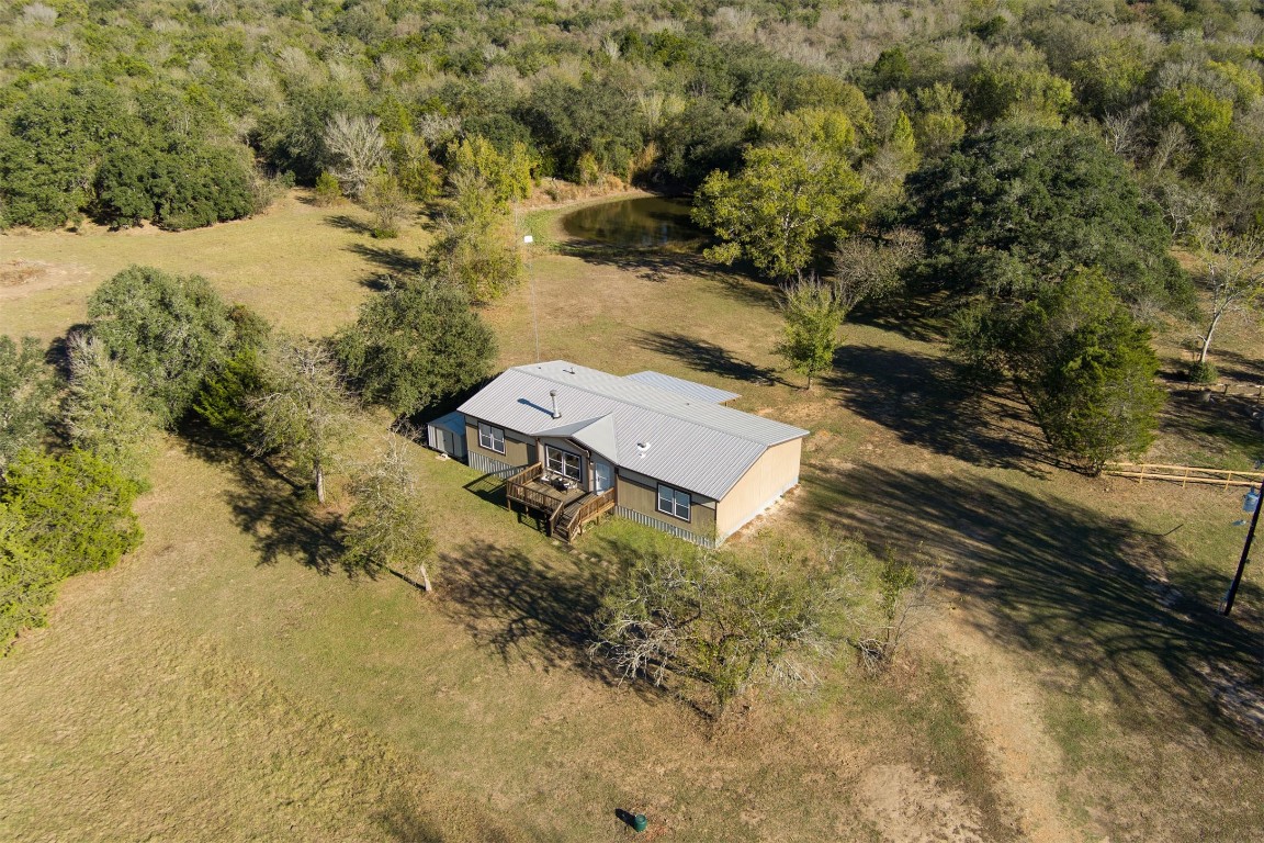 421 Krchnak Road Smithville, TX 78957 - Photo 3 of 40 an aerial view of a house with a yard