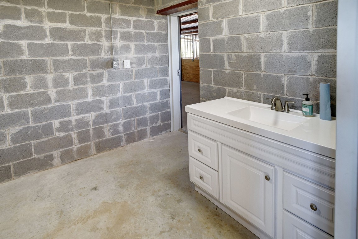 421 Krchnak Road Smithville, TX 78957 - Photo 36 of 40 a bathroom with a sink and a shower