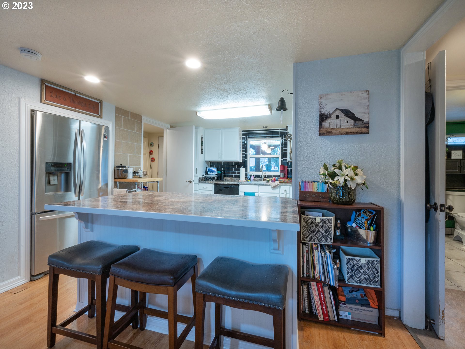 820 West Fairview Drive Springfield, OR 97477 - Photo 9 of 32 a kitchen with a table and chairs in it