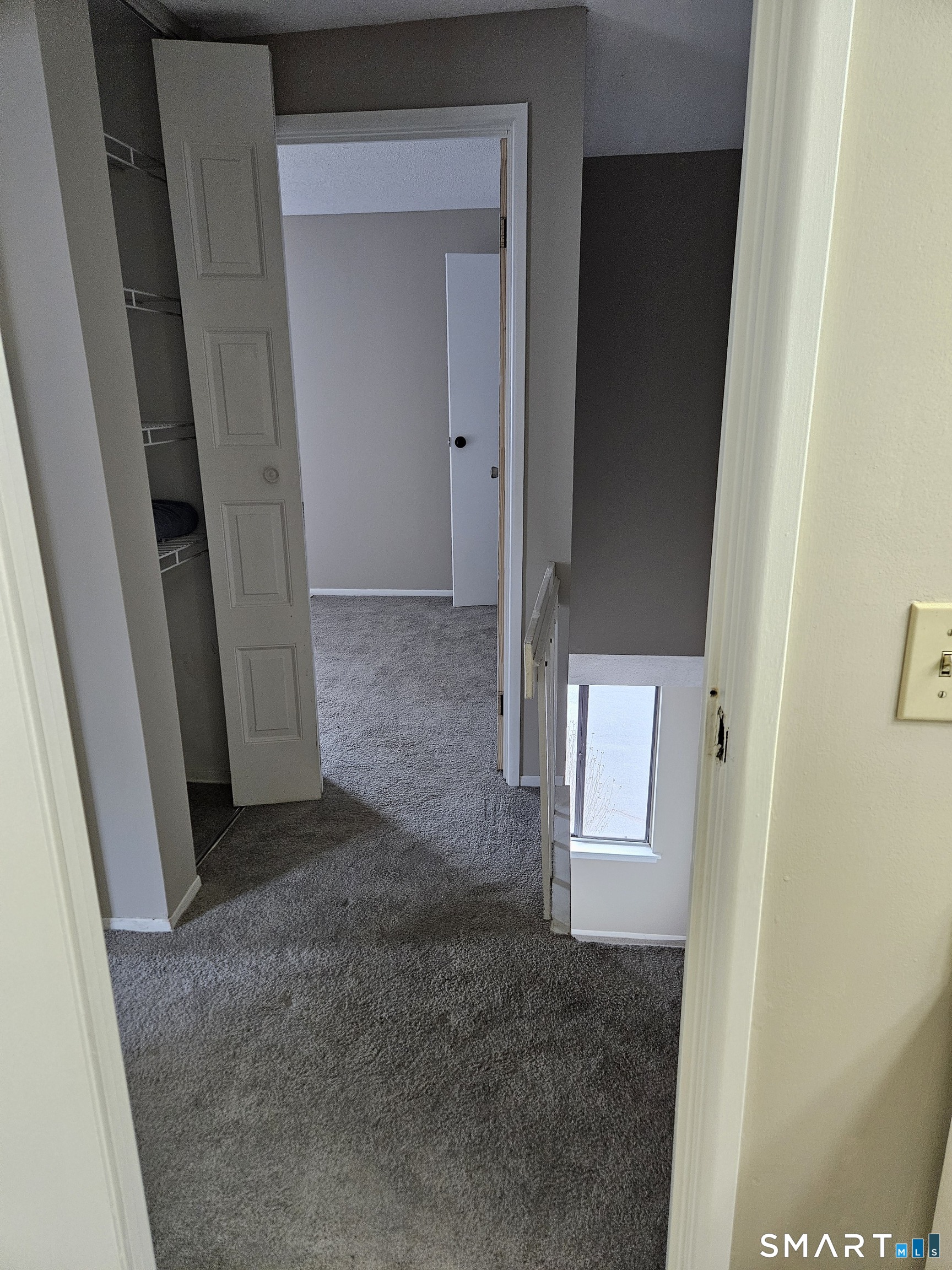 91 Trolley Crossing Lane, Unit 91 Middletown, CT 06457 - Photo 14 of 29 an empty room with windows