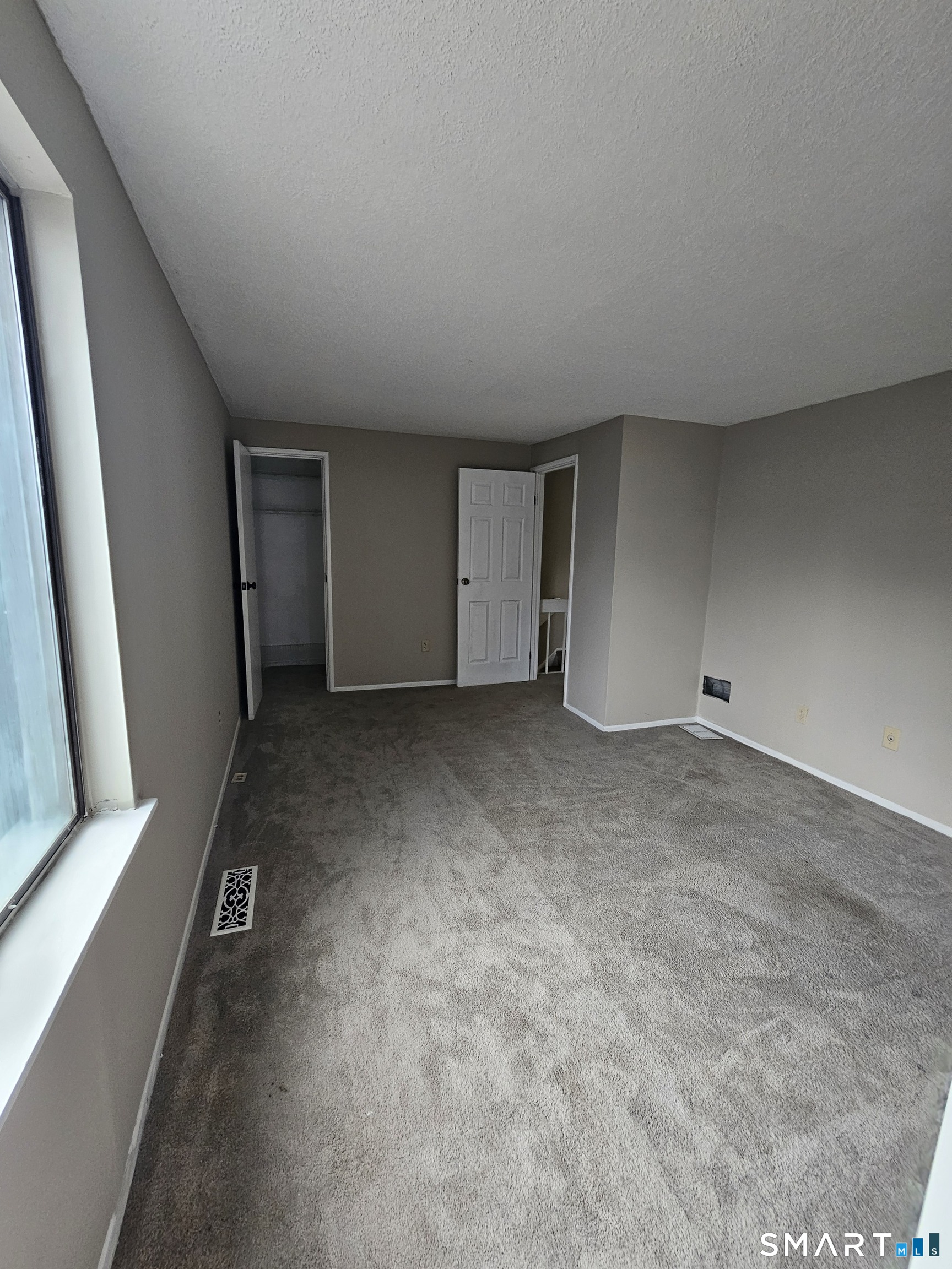 91 Trolley Crossing Lane, Unit 91 Middletown, CT 06457 - Photo 18 of 29 a view of an empty room