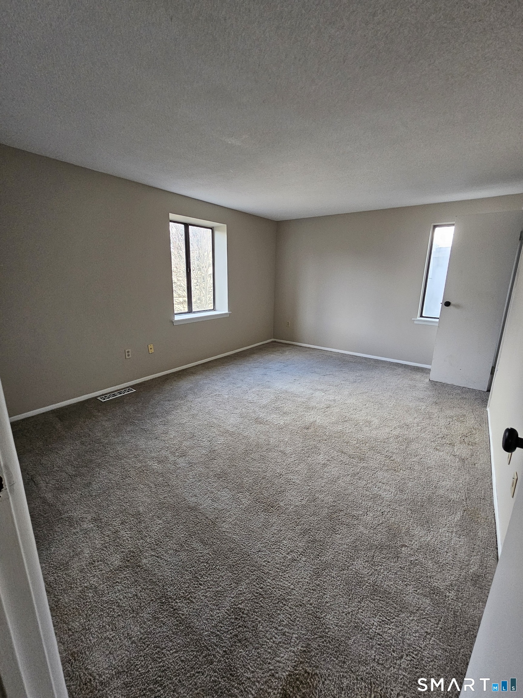 91 Trolley Crossing Lane, Unit 91 Middletown, CT 06457 - Photo 20 of 29 an empty room with a window