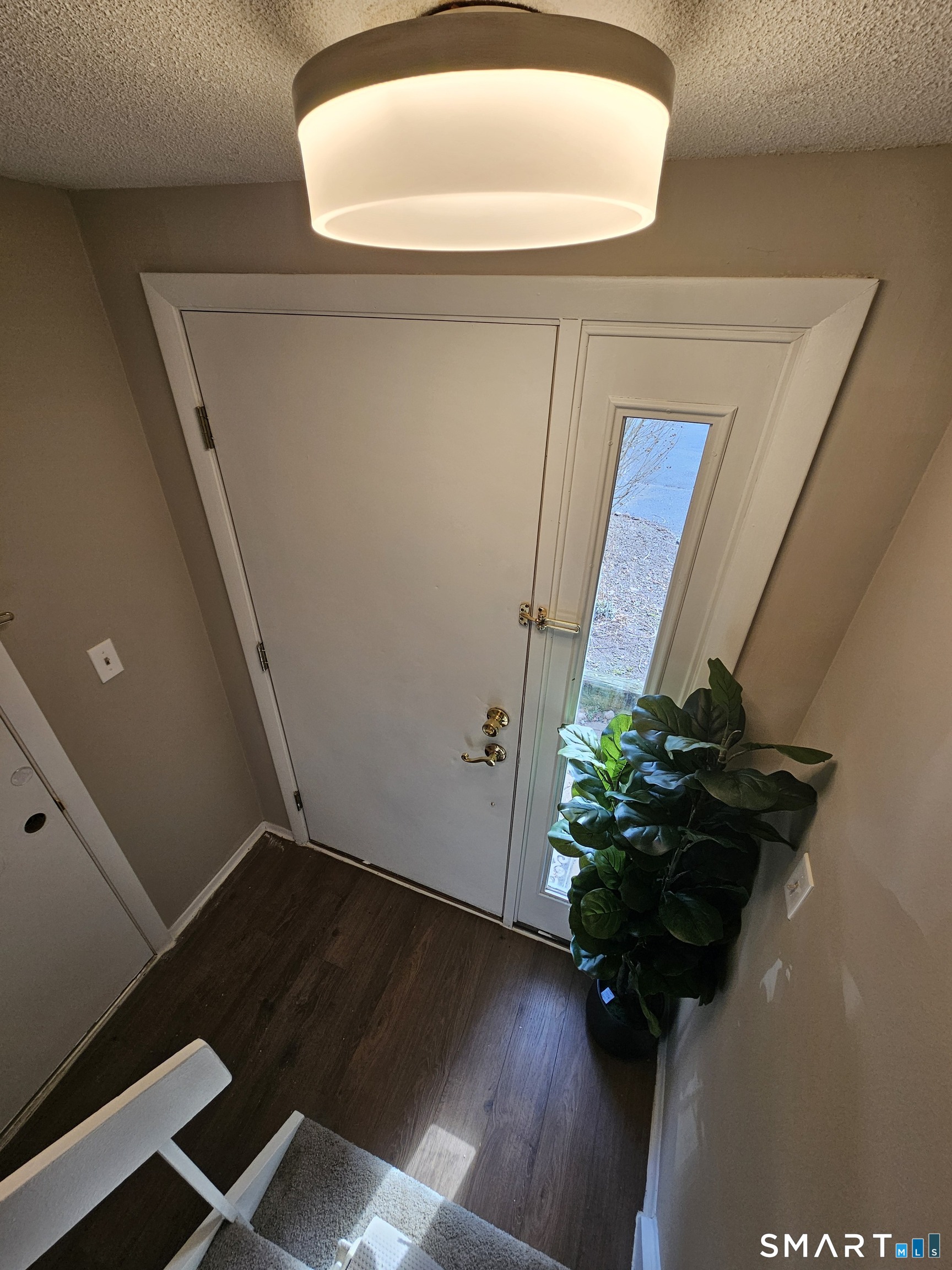 91 Trolley Crossing Lane, Unit 91 Middletown, CT 06457 - Photo 24 of 29 a bathroom with a sink and a mirror