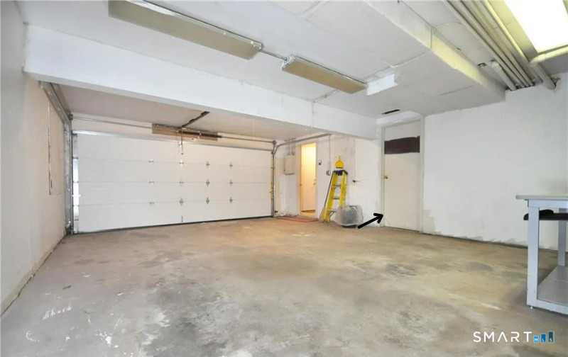 91 Trolley Crossing Lane, Unit 91 Middletown, CT 06457 - Photo 29 of 29 a view of a garage