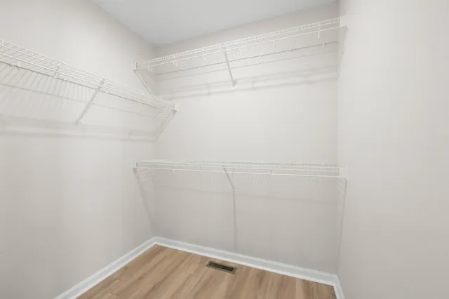 a view of a room with racks on the wall