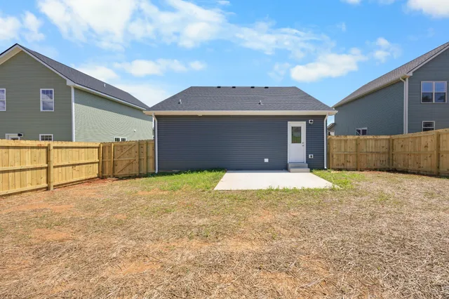 a view of backyard of house