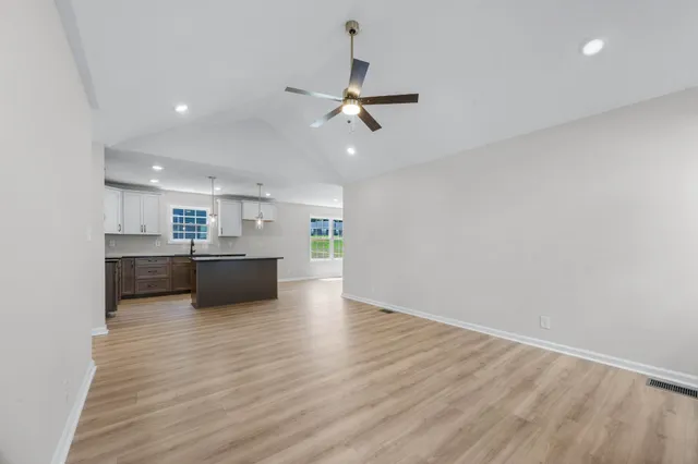 a view of kitchen with wooden floor