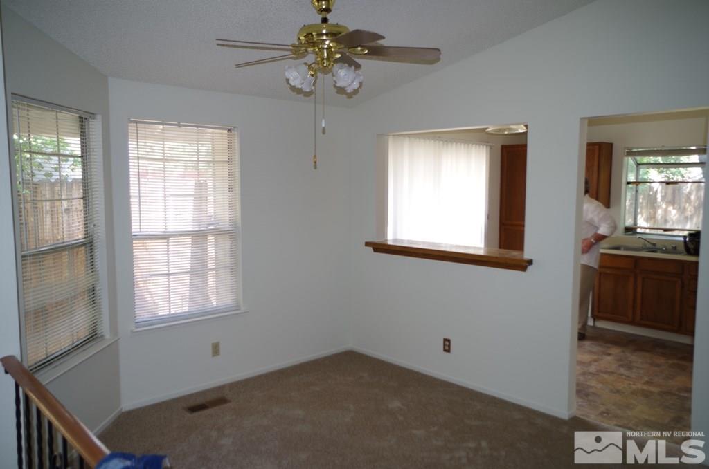 6129 Walnut Creek Road Reno, NV 89523 - Photo 7 of 15 a view of an empty room with a window
