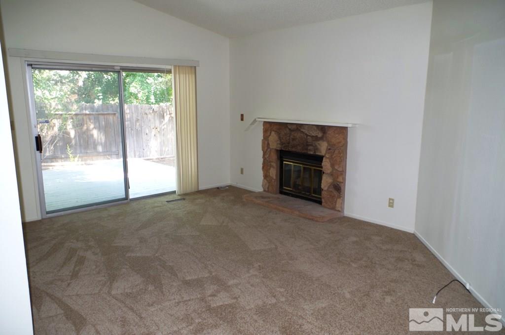 6129 Walnut Creek Road Reno, NV 89523 - Photo 8 of 15 a view of empty room with front door