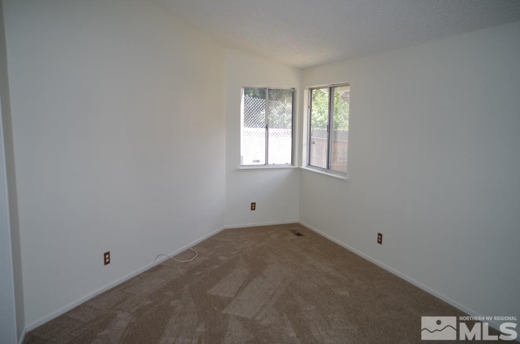6129 Walnut Creek Road Reno, NV 89523 - Photo 9 of 15 an empty room with a window