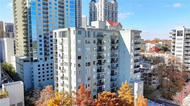 a city view with tall buildings and a street