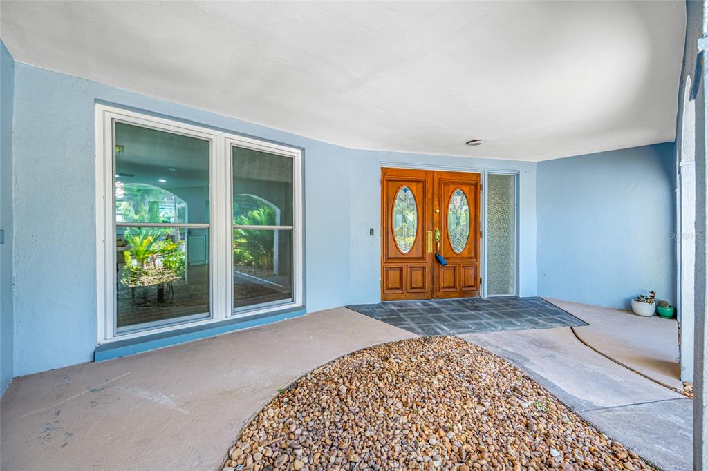 656 Mehlenbacher Road Belleair, FL 33756 - Photo 4 of 49 a view of a room with a large window