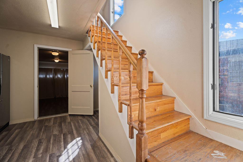 3514 25th Street Lubbock, TX 79410 - Photo 19 of 27 a view of entryway and hall with wooden floor