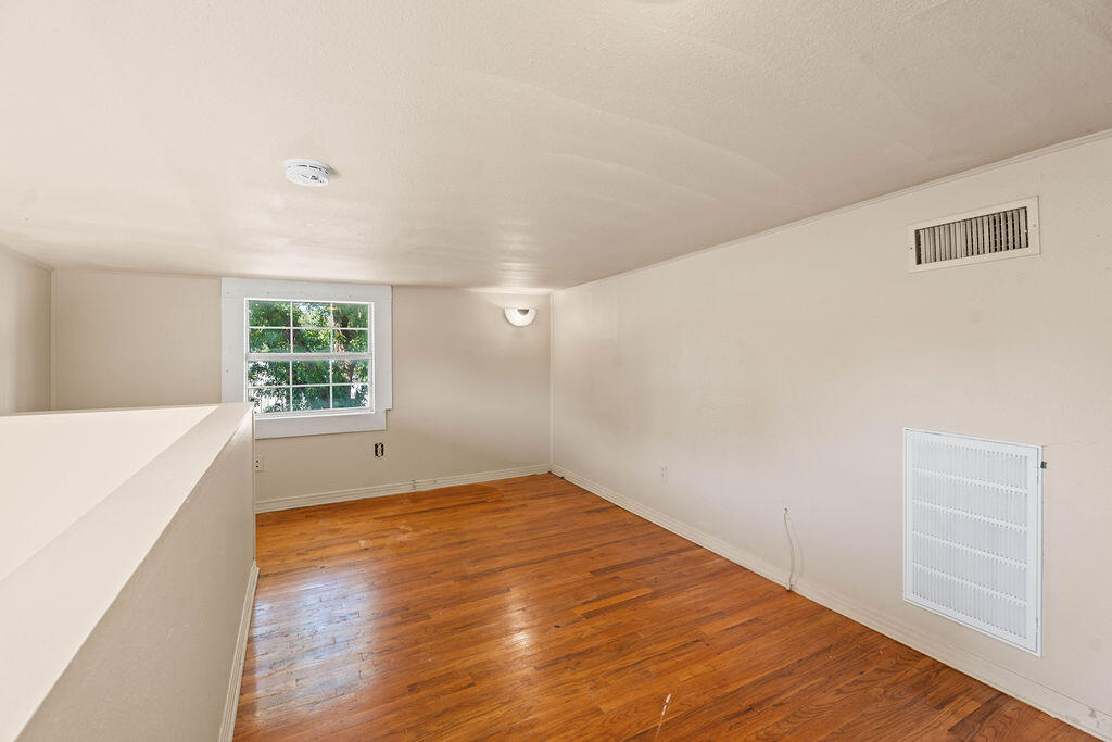 3514 25th Street Lubbock, TX 79410 - Photo 20 of 27 an empty room with windows
