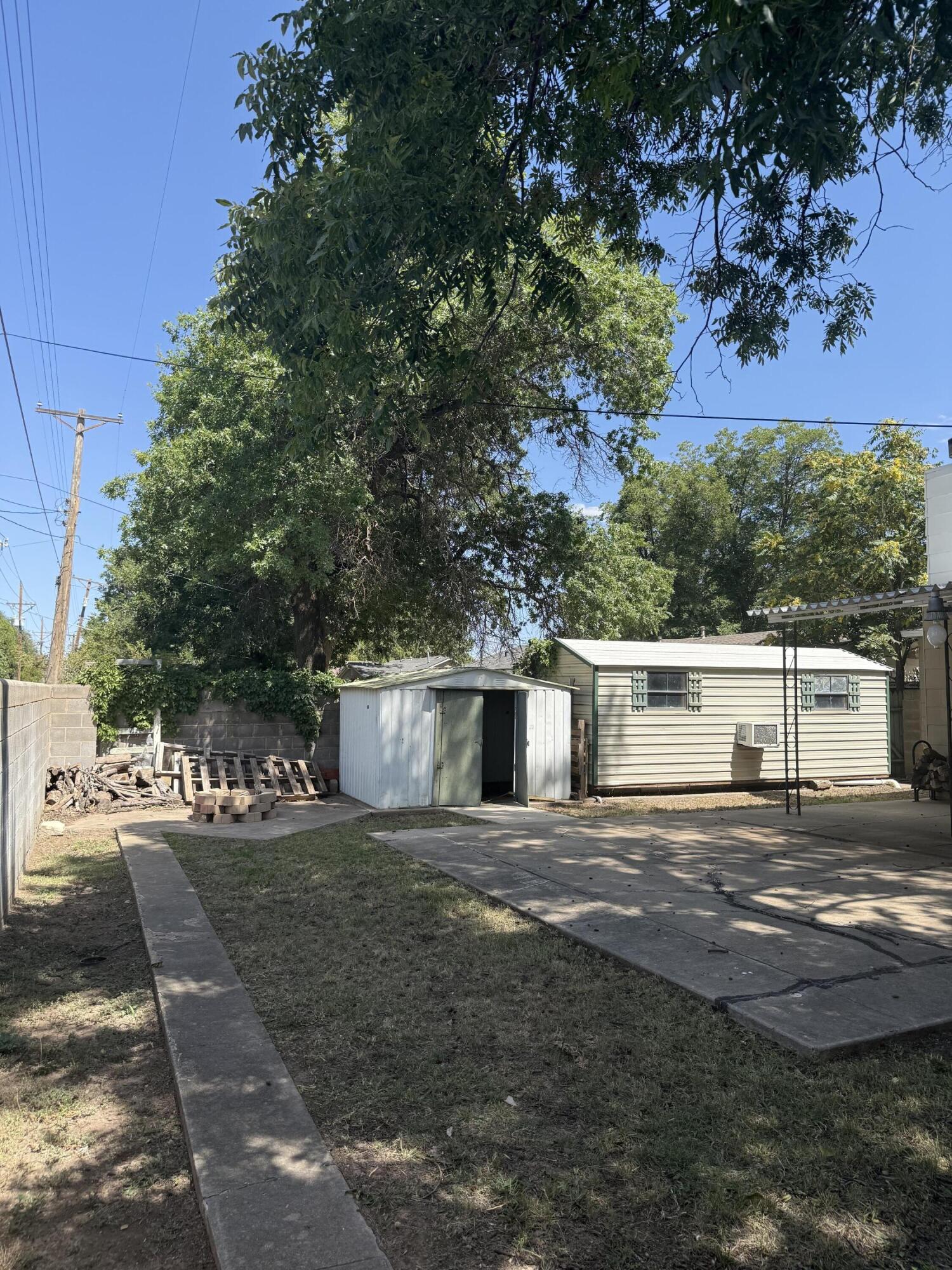 3514 25th Street Lubbock, TX 79410 - Photo 26 of 27 a view of a house with a yard