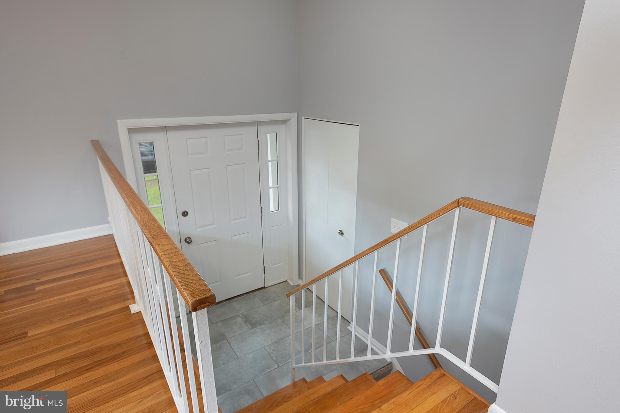 1316 Gatefield Road Baltimore, MD 21228 - Photo 3 of 30 a view of a hallway with staircase