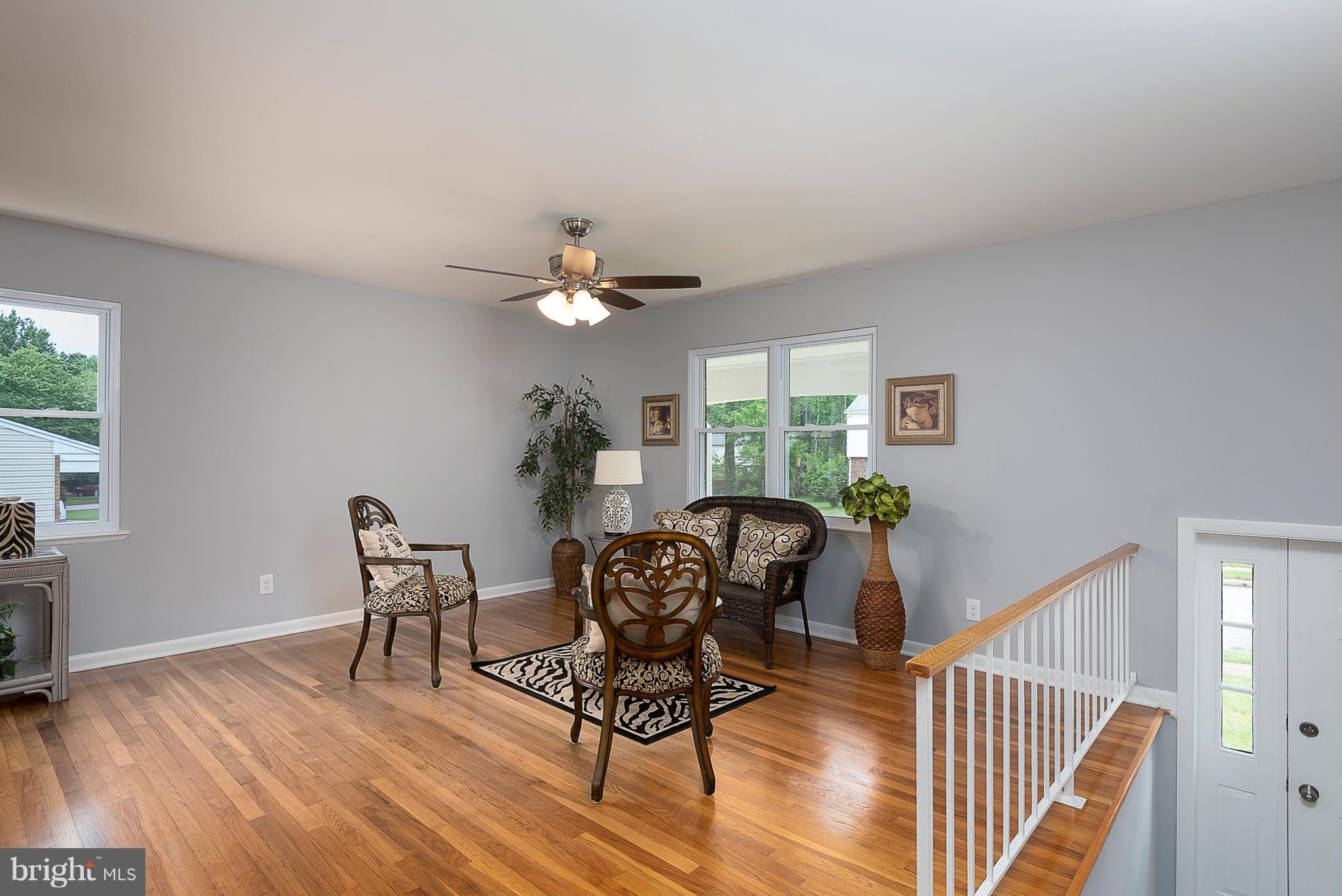 1316 Gatefield Road Baltimore, MD 21228 - Photo 4 of 30 a view of a livingroom with furniture and wooden floor