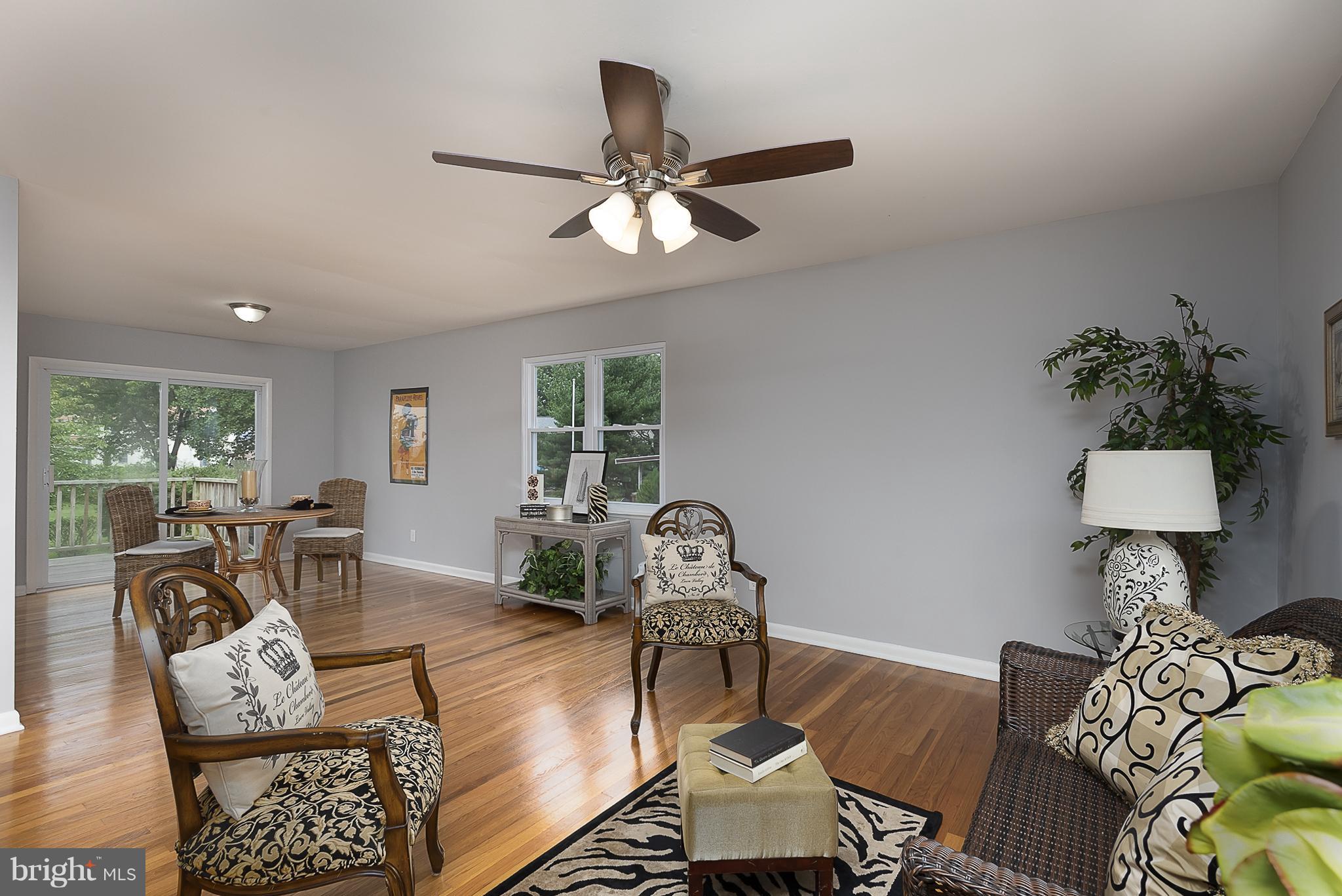 1316 Gatefield Road Baltimore, MD 21228 - Photo 8 of 30 a living room with furniture and a large window