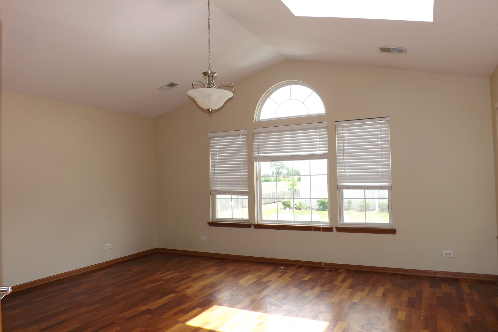 21130 Gray Hawk Drive Matteson, IL 60443 - Photo 12 of 14 a view of empty room with wooden floor and fan