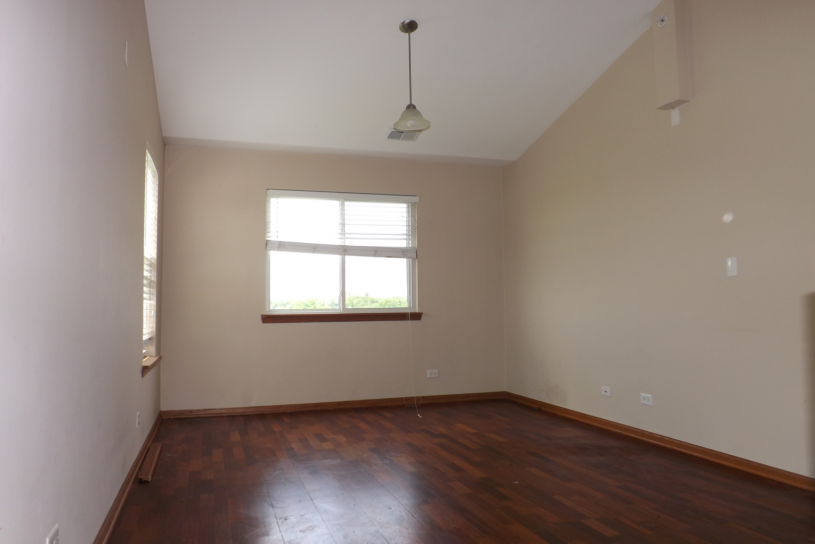 21130 Gray Hawk Drive Matteson, IL 60443 - Photo 10 of 14 an empty room with wooden floor and windows