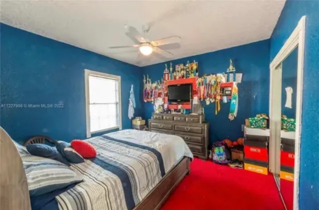 a bathroom with a sink toilet tub and shower