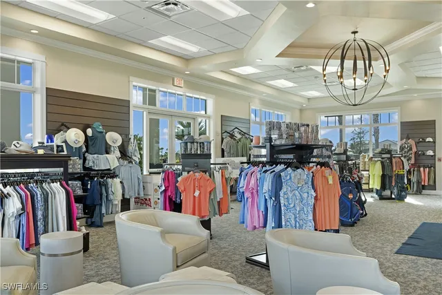 a living room filled with lots of gym equipment