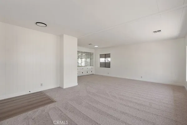 a view of a room that has a window