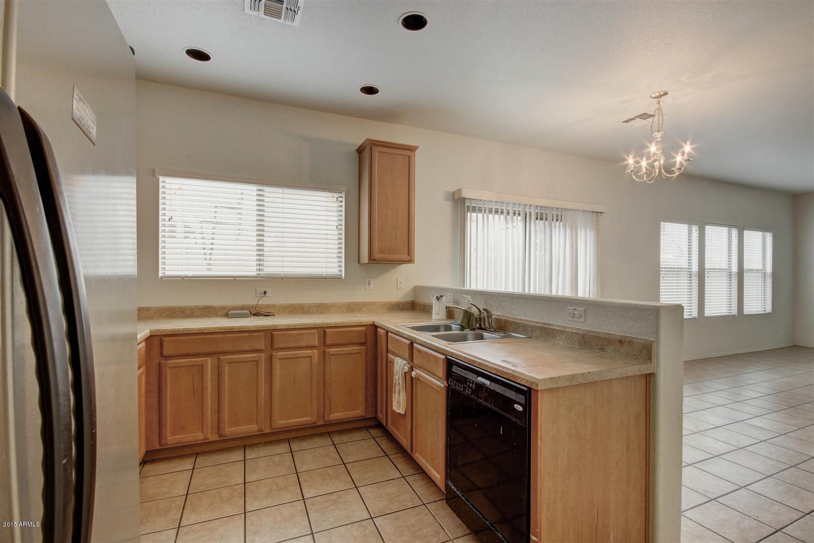 9452 West Jamestown Road Phoenix, AZ 85037 - Photo 12 of 28 Kitchen and eat-in area