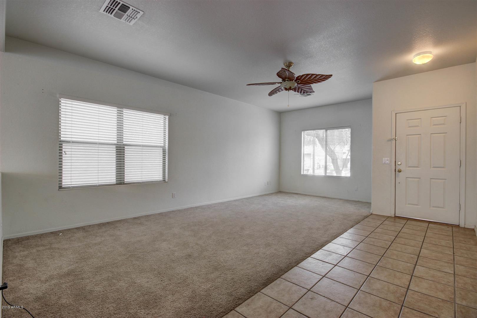 9452 West Jamestown Road Phoenix, AZ 85037 - Photo 4 of 28 Formal Living and Entry