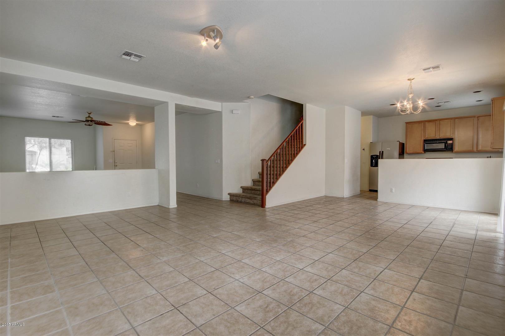 9452 West Jamestown Road Phoenix, AZ 85037 - Photo 6 of 28 Family Room and Kitchen
