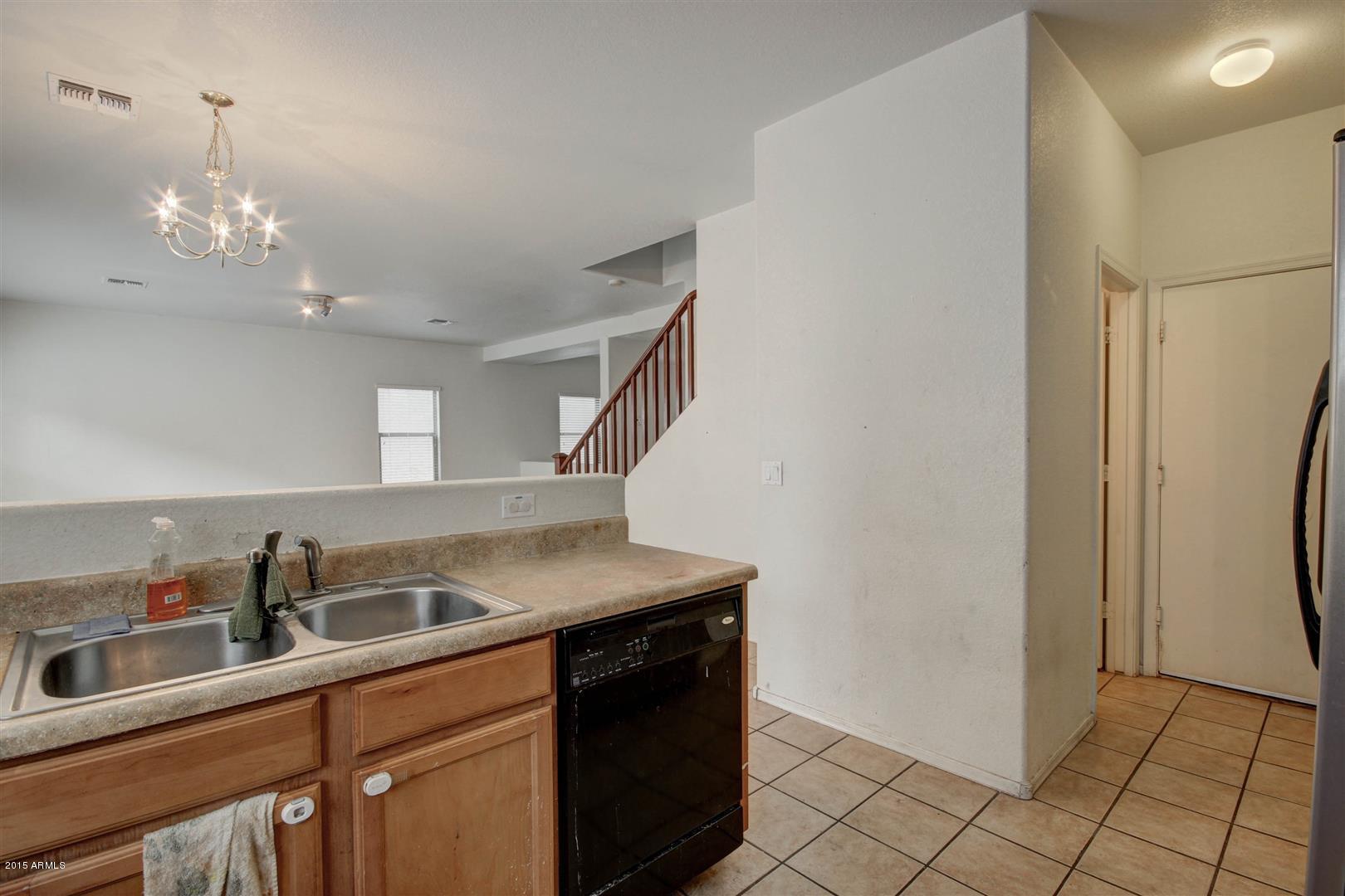 9452 West Jamestown Road Phoenix, AZ 85037 - Photo 10 of 28 Kitchen towards family room
